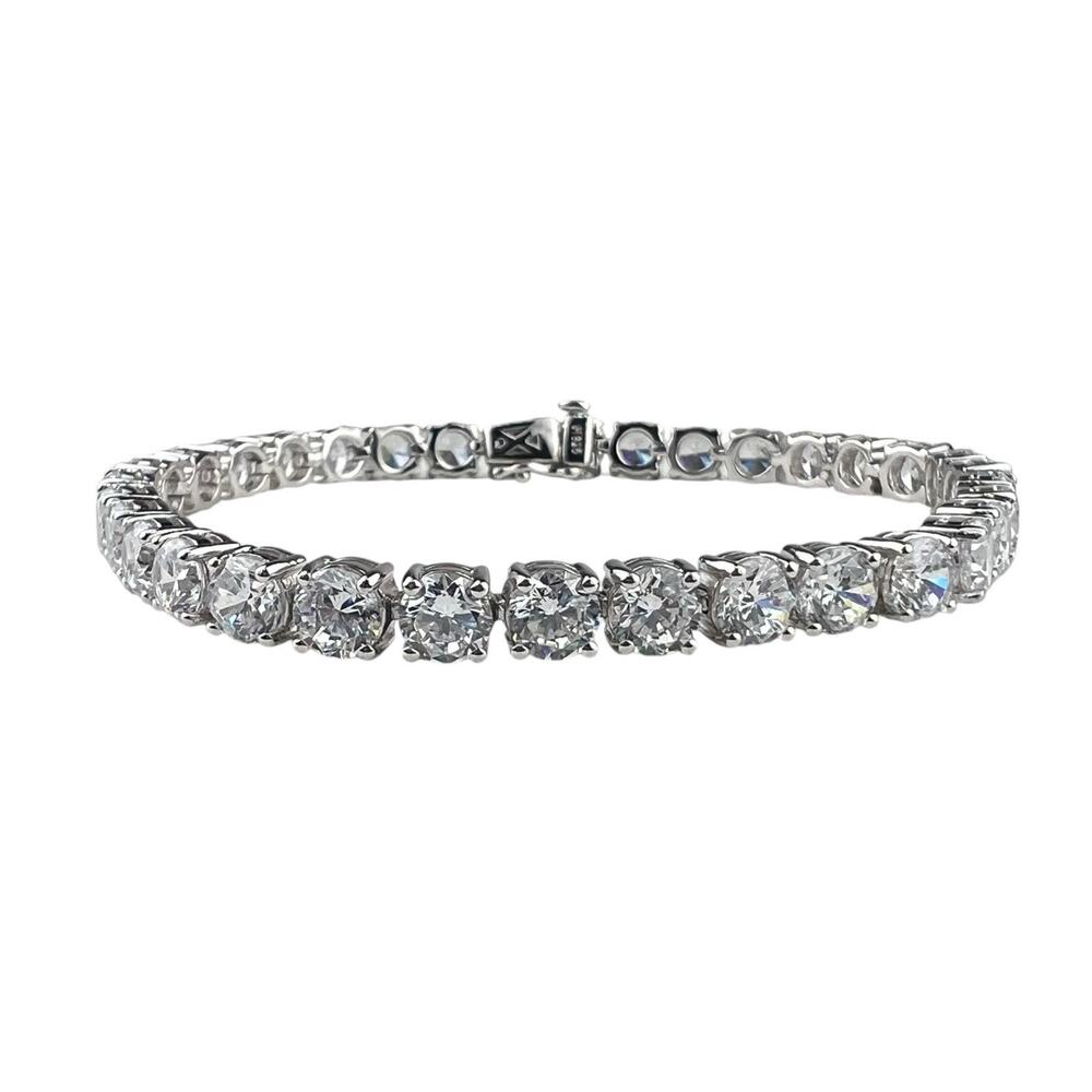 Signed H Sterling Silver Tennis Bracelet Clear Faceted Gemstones 7.25"